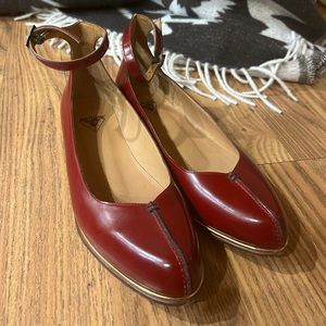 Fluevog ModVog “Jen” ankle-strap flats, red with gold trim, 7